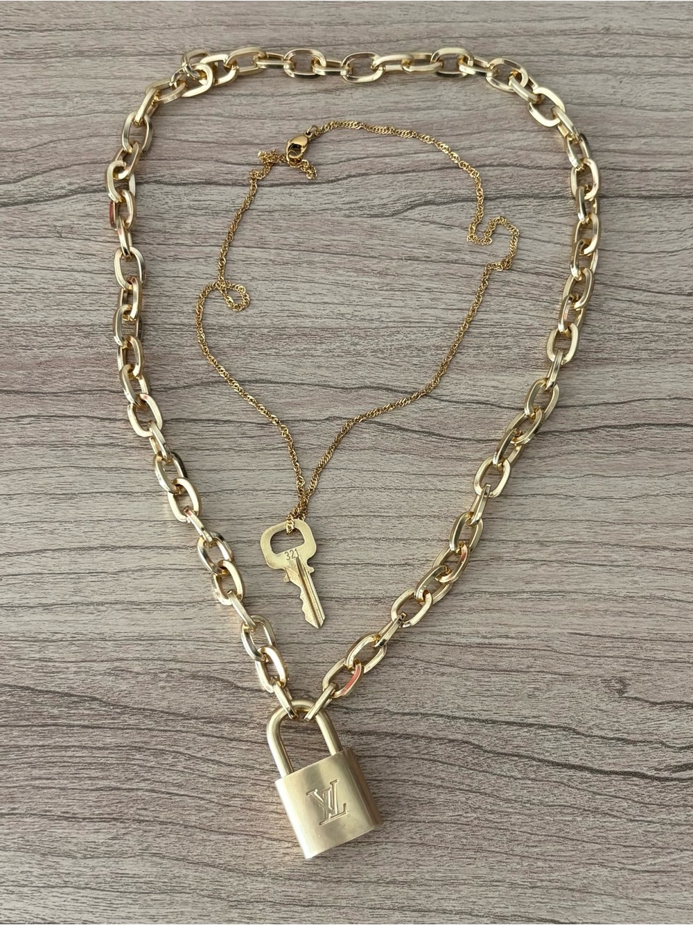 Louis Vuitton Brass lock Key + 2 unbranded chains + velvet pouch